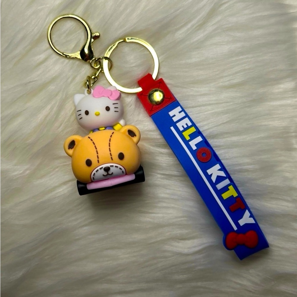 New Hello Kitty Keychain/Wristlet Riding in Teddy Bear Car